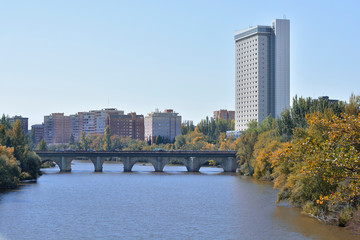 Fototapeta na wymiar Cityscape of Valladolid with the Puente Mayor bridge upon the Pisuerga river.