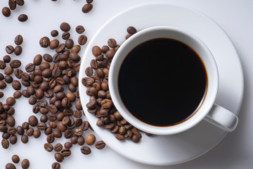cup of coffee and coffee beans with space