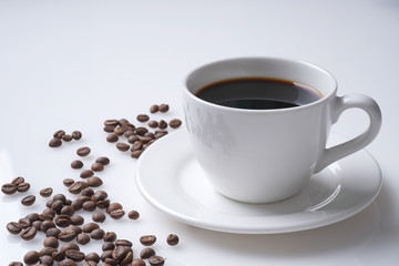 cup of coffee and coffee beans with space