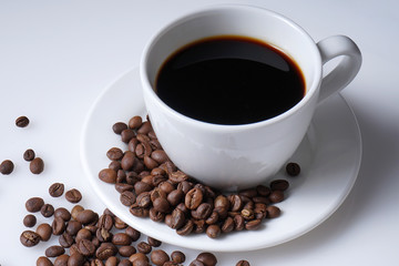 cup of coffee and coffee beans with space