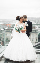 Naklejka premium Wedding couple bride and groom holding hands