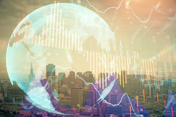 Forex graph on city view with skyscrapers background multi exposure. Financial analysis concept.