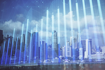 Forex chart on cityscape with skyscrapers wallpaper multi exposure. Financial research concept.