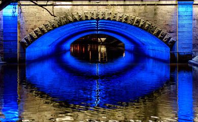 Big blue eye light under the bridge