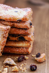 Raisin cookies on a wooden surface