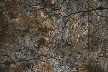 abstract creative texture using multi-exposure technique. Dark background with stone surface and cracks
