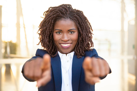 Happy Positive Recruit Agent Pointing Fingers At Camera, Choosing You. Young African American Business Woman Standing And Posing Outside. Career Concept