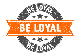 be loyal round stamp with orange ribbon. be loyal