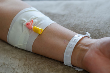 Patients hand with an IV