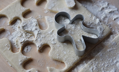 making Christmas cookies from dough