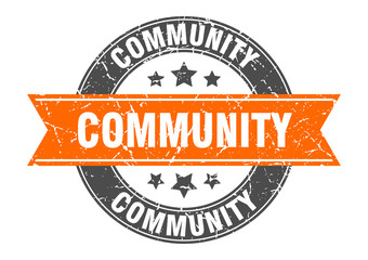 community round stamp with orange ribbon. community