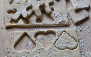 making Christmas cookies from dough