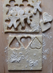 making Christmas cookies from dough