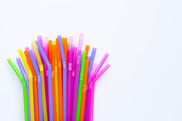 Colorful plastic  straws on white background.