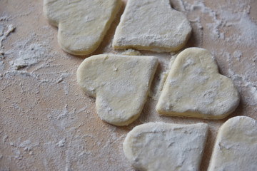 making Christmas cookies from dough
