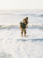 Young couple in love on beach.