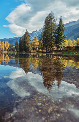 Landscape with lake and mountains in autumn in the Chamonix Valley.