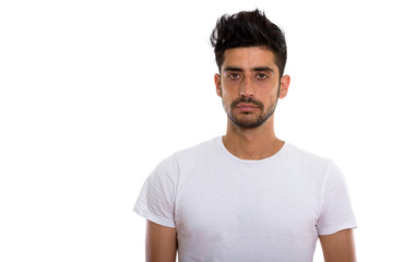 Portrait of young handsome bearded Persian man