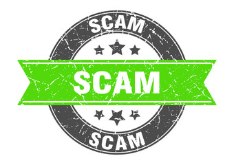 Obraz premium scam round stamp with green ribbon. scam
