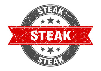 steak round stamp with red ribbon. steak
