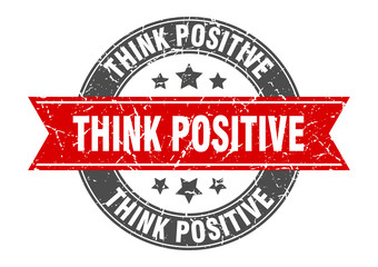 think positive round stamp with red ribbon. think positive