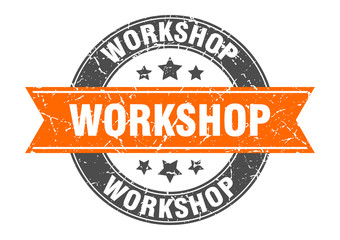 workshop round stamp with orange ribbon. workshop