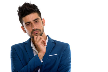 Young handsome bearded Persian businessman in suit