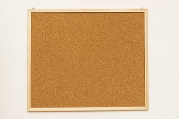 Fototapeta premium Cork board isolated on white background on wall.