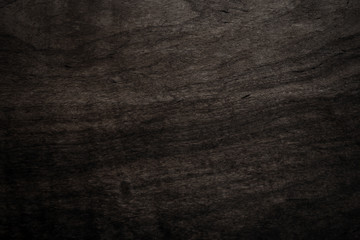 Black wood texture background coming from natural tree. Abstract dark wooden panel with beautiful patterns.Background for interior design. 