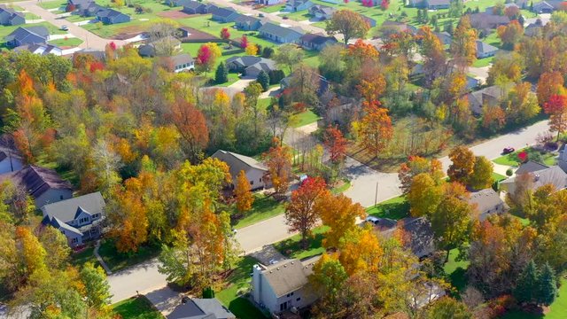 Beautiful neighborhoods, homes, Fall colors, colorful trees, aerial drone view.