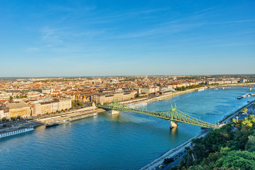 Naklejka na ściany i meble Budapest, Hungary - October 01, 2019: Panoramic cityscape view of hungarian capital city and Danube river of Budapest from the Gellert Hill.