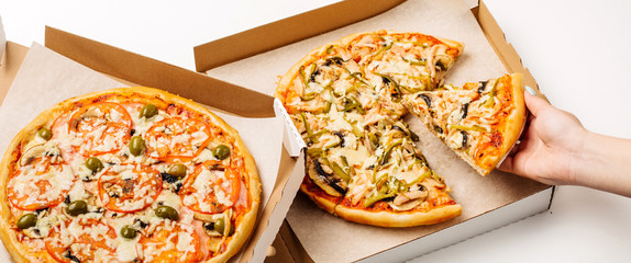 Top view of hand take homemade pizza