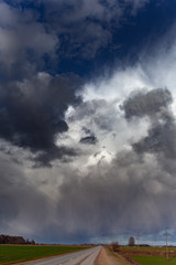 Obraz na płótnie Canvas Cloudy day in countryside of Latvia.