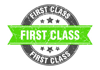 first class round stamp with green ribbon. first class
