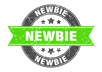 Fototapeta premium newbie round stamp with green ribbon. newbie
