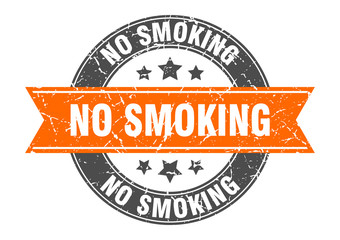 no smoking round stamp with orange ribbon. no smoking