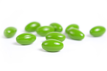 Moringa Oleifera or Malunggay oil capsules on white background	