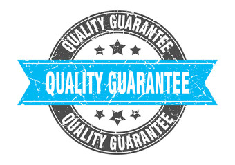quality guarantee round stamp with turquoise ribbon. quality guarantee
