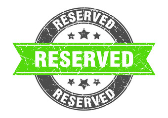reserved round stamp with green ribbon. reserved