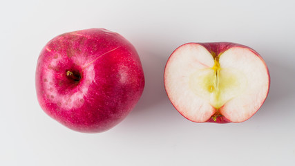 Top view of organic red apple isolated on white background.