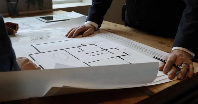 Architects looking at plans