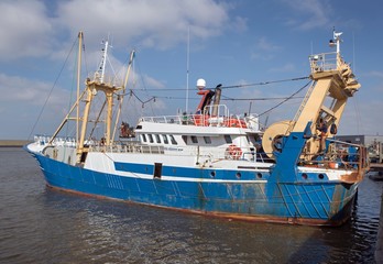 Modern Fishingboat in harbor Harlingen Netherlands