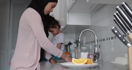 Mother and daughter at home