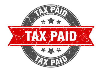 tax paid round stamp with red ribbon. tax paid