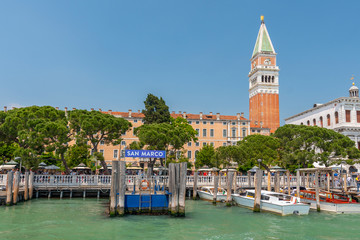 View of the lagoon with Campanile on Piazza di San Marco and water bus ( vaporetto ) stop, Venice,...