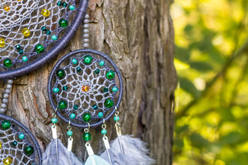 Handmade dream catcher with feathers threads and beads rope hanging