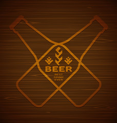 Vector template with beer bottles with hops and malt on a wooden background. Best drink ever.