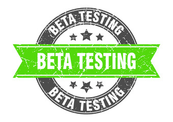 beta testing round stamp with green ribbon. beta testing
