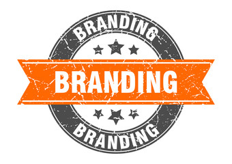 branding round stamp with orange ribbon. branding