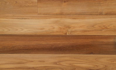 Closeup of designed brown teak wooden wall. A natural art background and template. 